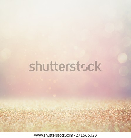 abstract bokeh lights background, gold, silver pink and white colors.
