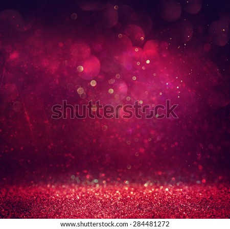 glitter vintage lights background. gold, red and purple. defocused