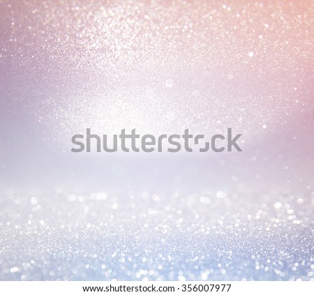 glitter vintage lights background. light silver, and pink. defocused.