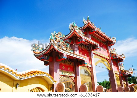 Grand Chinese Buddha Temple Gate fully decorated with asian style art like dragon in Asia , Thailand