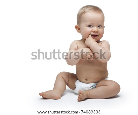Sweet little boy sitting with finger in the mouth Sweet little boy sitting with finger in the mouth