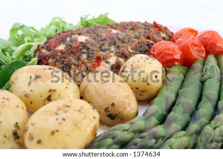Healthy restaurant diet food promoting weight loss, potatoes, salad, asparagus, chicken and tomatoes on white, macro, close up, copy space, isolated