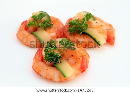 Chinese food, gourmet tiger king prawns served with a garnish with copy space, isolated on white