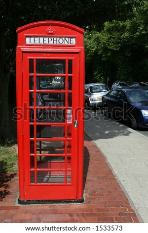 Traditional now extinct old red telephone box from england, with copy space