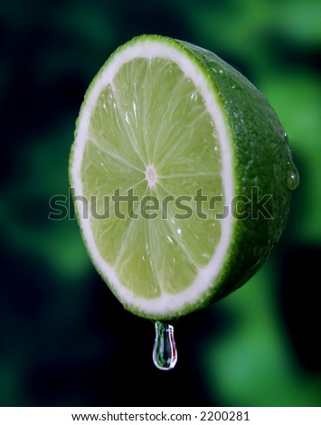 Healthy green lime fruit and water droplet photography, macro closeup