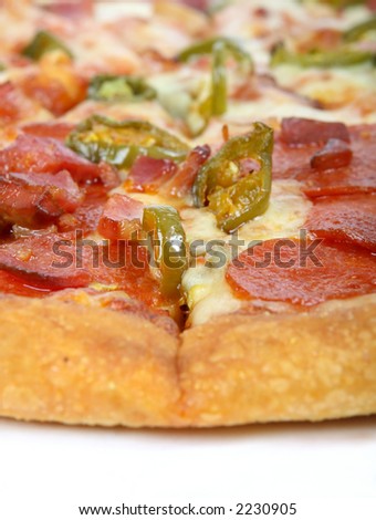 Hot summer jalapeno pepper and meat pizza, macro close up isolated over white