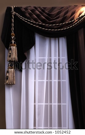 swag curtains with sheers on window