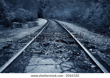 railroad track in low key country setting
