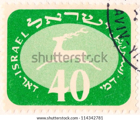 ISRAEL - CIRCA 1952: An old used Israeli postage stamp (campaign poster) showing white running deer on green background with inscription \