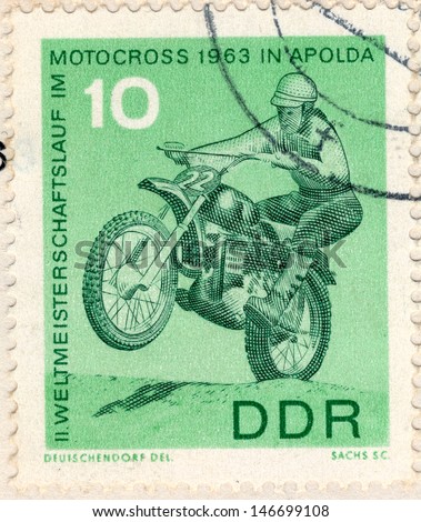 GERMANY - CIRCA 1963: An old used German Democratic Republic postage stamp issued in honor of the World Motocross Championship 1963; series, circa 1963