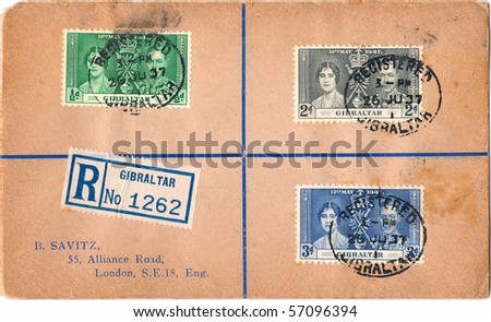 GIBRALTAR - CIRCA 1937: Vintage envelope and stamps in honor of the King George VI Coronation with inscription \