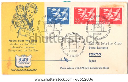 SWEDEN - CIRCA 1957: An old used Swedish envelope (campaign poster) issued in honor of the First Regular Flight Stockholm - Tokyo showing a Japanese woman with a child, series, circa 1957