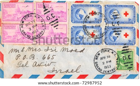 UNITED STATES - CIRCA 1953: An old envelope and four postage stamps issued in honor of the founding of the International Red Cross with inscription \