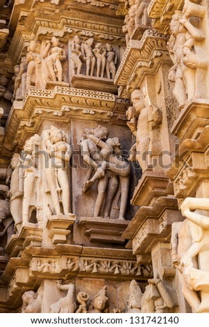 KHAJURAHO, INDIA - APRIL 17: Stone carved erotic sculptures in Hindu temple on April 17, 2012 in Khajuraho, India. Unesco World Heritage.