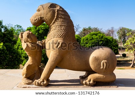 KHAJURAHO, INDIA - APRIL 17: King and lion fight statue near erotic temple on April 17, 2012 in Khajuraho, India. Unesco World Heritage.