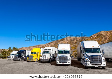 UTAH, USA - OCT 7: Trucks seen in the parking lot of the Utah highway rest area, October 7, 2013, UTAH, USA