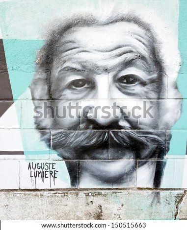 OPATIJA CROATIA - CIRCA JULY 2013: Auguste Lumiere graffiti in Angiolina park, Opatija circa July 2013. Faces on this wall represent famous people who visited this Croatian touristic city.