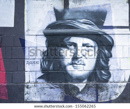 OPATIJA CROATIA - CIRCA JULY 2013: Zucchero graffiti in Angiolina park, Opatija circa July 2013. Faces on this wall represent famous people who visited this Croatian touristic city.
