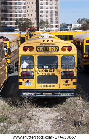 NEW YORK CITY, USA - OCTOBER 27: A New York City school buses. In the United States, school buses provide an estimated 10 billion student trips every year. October 27, 2013 in New York City, USA