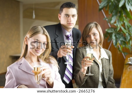 Group of People With Glasses of Champagne. Short Depth of Focus (On Woman's in Pink Jacket Face).