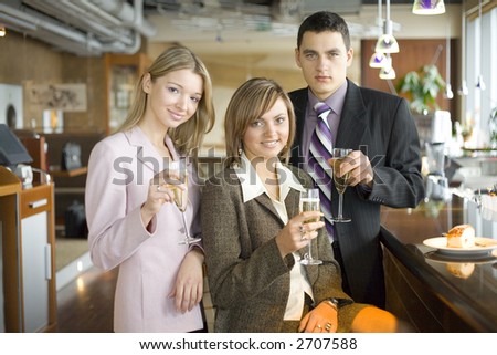 Group of People With Glasses of Champagne. Short Depth of Focus (On Woman\'s in the Middle Face).