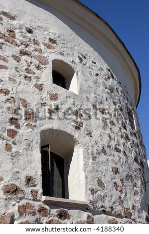 Part of a wall of the Round tower in Vyborg, Russia