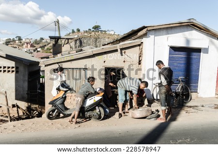 ANTANANARIVO, MADAGASCAR - AUG, 17: A small tire shop in the capital city of Madagascar Aug 17, 2014 in Antananarivo. Madagascar is one of the poorest countries in the world