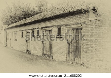 Line of old sheds vintage effect with wooden doors