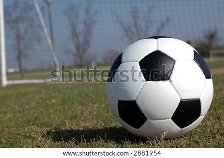 Soccer Ball on Field.  Goal in Background