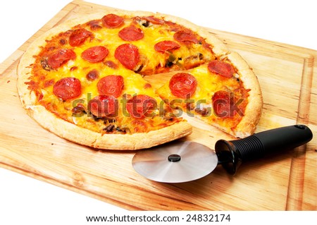 Pepperoni pizza on cutting board with pizza cutter.  Isolated on white background.