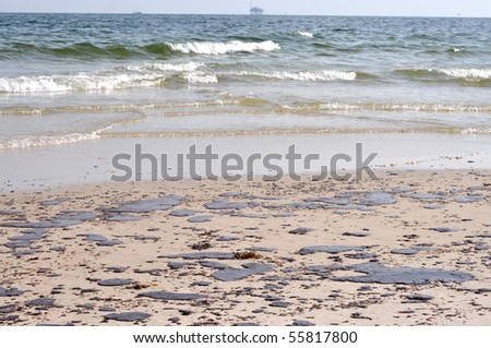 GULF SHORES, ALABAMA - JUNE 12: Gulf oil spill is shown on a beach on June 12, 2010 in Gulf Shores, Alabama.