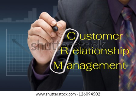 Businessman drawing circle on customer relationship management