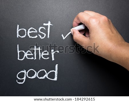 Hand writing correct mark with chalk on the best choice