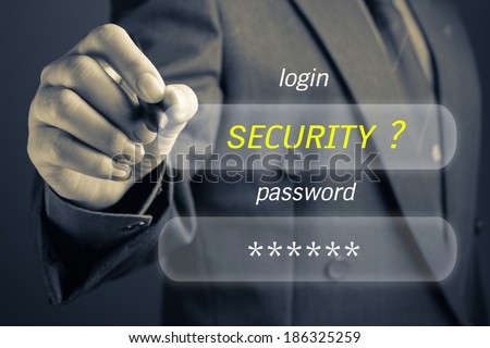 Businessman with Internet Security concept, log in and password button on screen