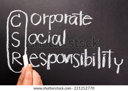 Corporate social responsibility (CSR) handwriting with chalk