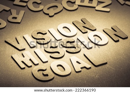 Vision, Mission and Goal words in small wood letters
