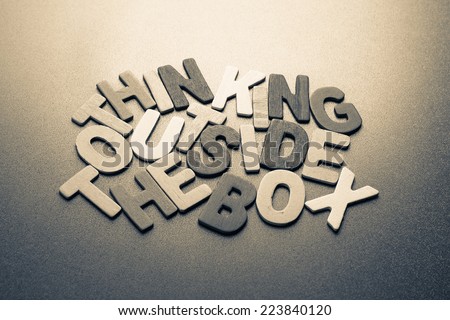 Abstract wood letters as Thinking outside the box concept