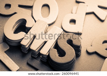 Stack wood letters as Content Management System (CMS)word
