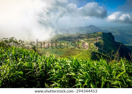 Mountain in the mist and clouds at Phu Tub Berk, tourism landmark in Petchaboon province of Thailand