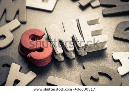 Small wood letters of SME, abbreviation of Small and Medium Sized Enterprise