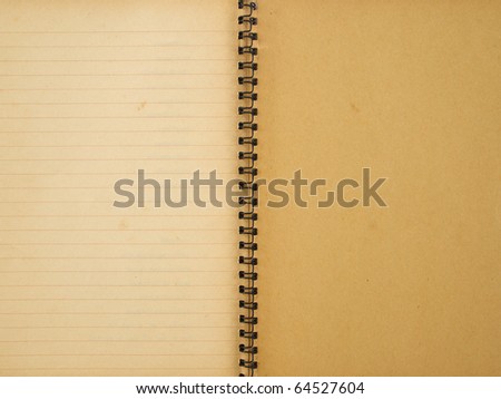 Opened last page of old yellowed spiral notebook