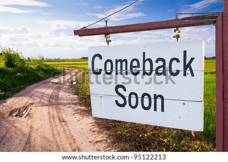 Come back soon wood sign with country road