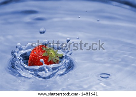 Fresh colored splash with strawberry