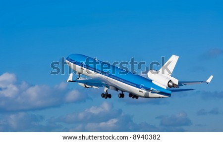 plane take off with blue sky