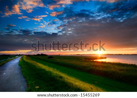 beautiful sunset and a country road