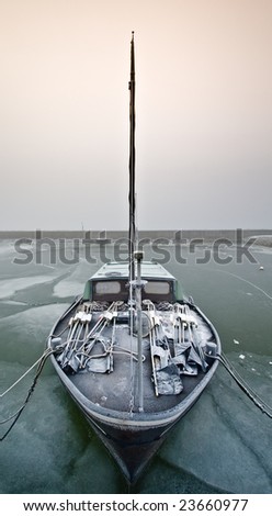 Dutch sailing boat on a cold day in winter (Friesland, The Netherlands)