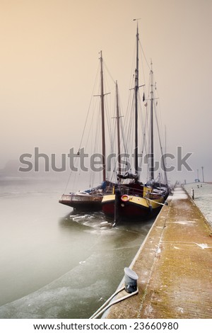 Dutch sailing boat on a cold day in winter (Friesland, The Netherlands)