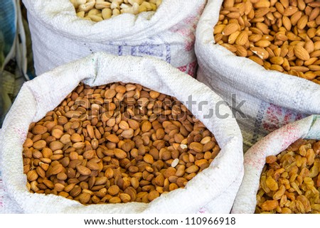 Apricot seeds in a bag on a market in Ladakh, India