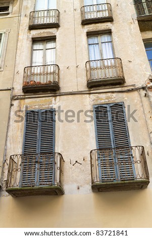 Typical italian balconies on a residential house near Como