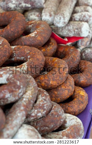 Food stand selling sausages in a market